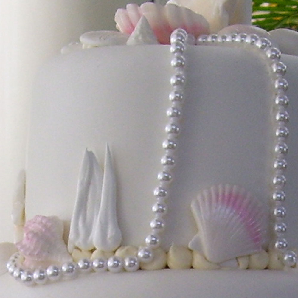 1-1_swiss-pastry-shop-bahamas-wedding-cake-with-shells-and-pearls